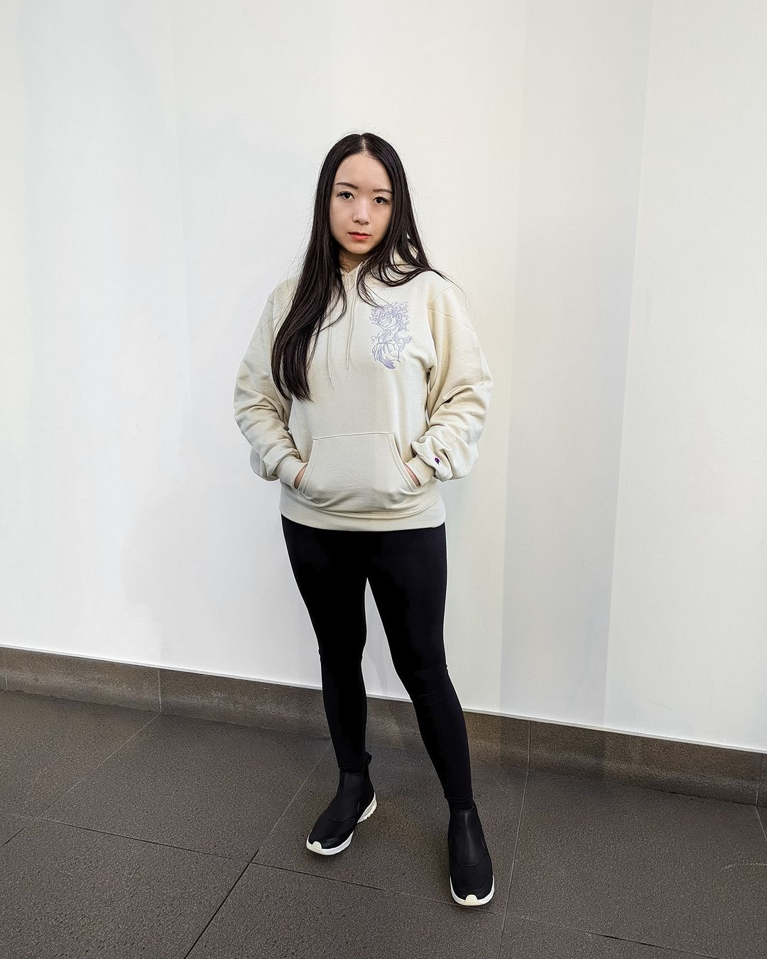 Female Model wearing Gear Five Luffy One Piece Hoodie Sweater with Minimalistic Embroidered Design 